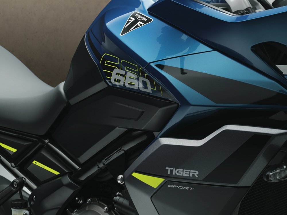close view of the blue paint on the tank with yellow strip and gray accents