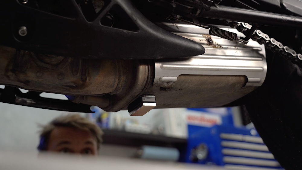 Green light magnet on the bottom of a motorcycle