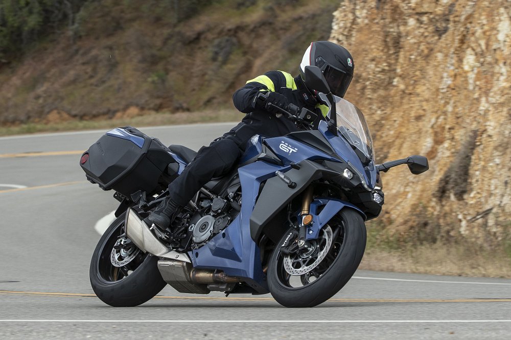 riding the Suzuki GSX-S1000GT+ on a curvy road