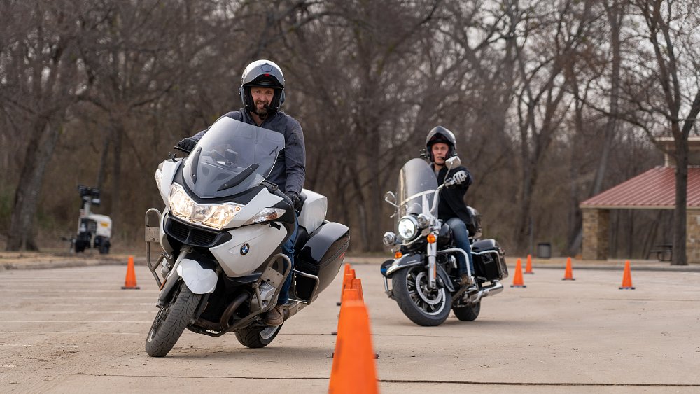 Zack and Ari practicing the cone weave on police pikes.