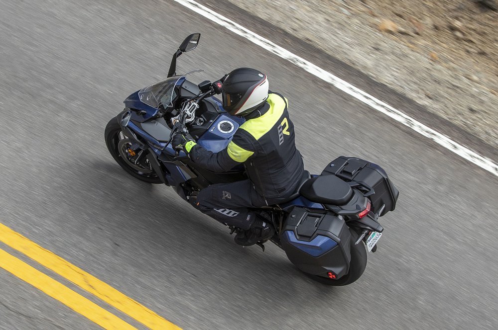 overhead shot of the Suzuki GSX-S1000GT+ on the road