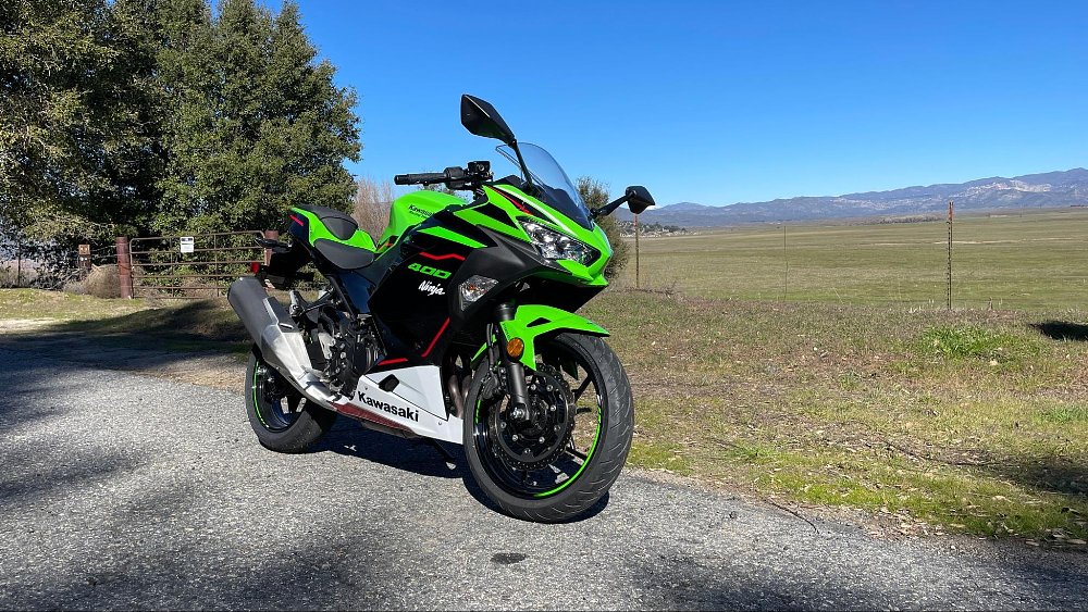A front 3/4 view of the green Kawasaki Ninja 400 sportbike