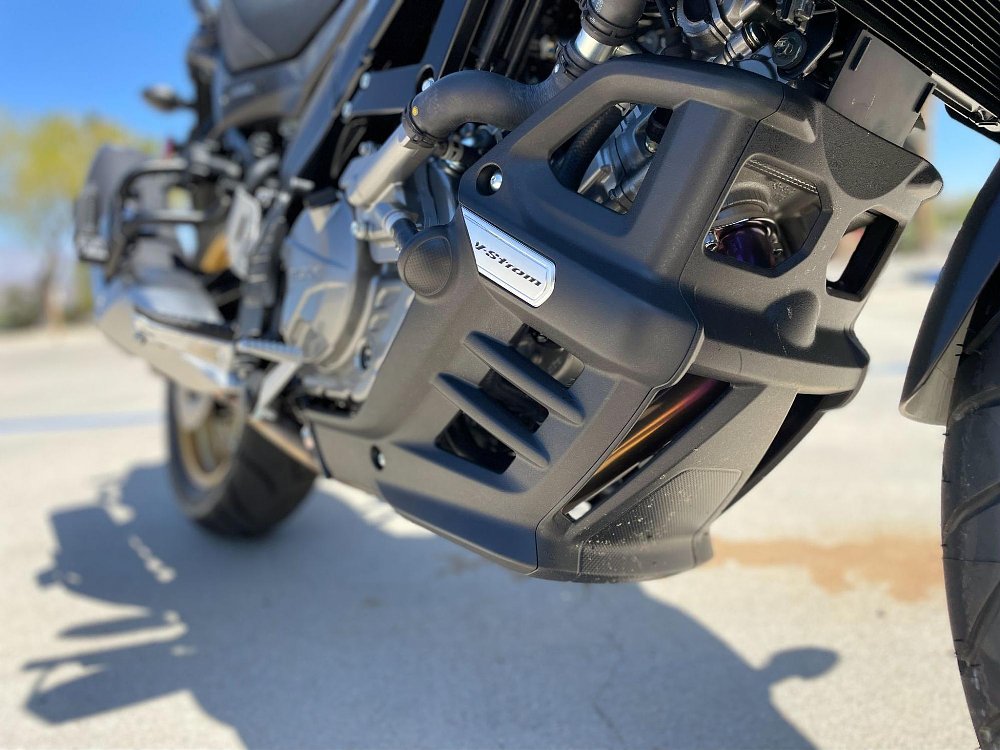 A close up photo of the plastic lower engine cowl on V-strom 650