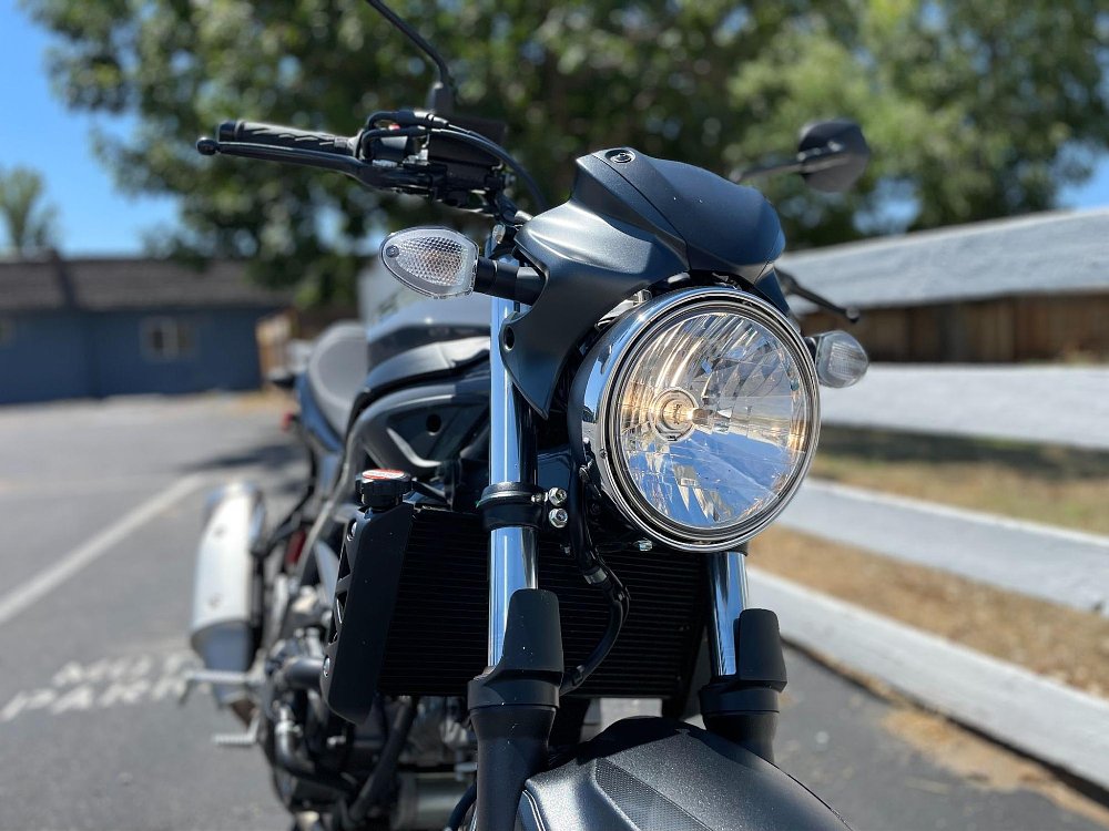 A close up of the SV650 round headlight