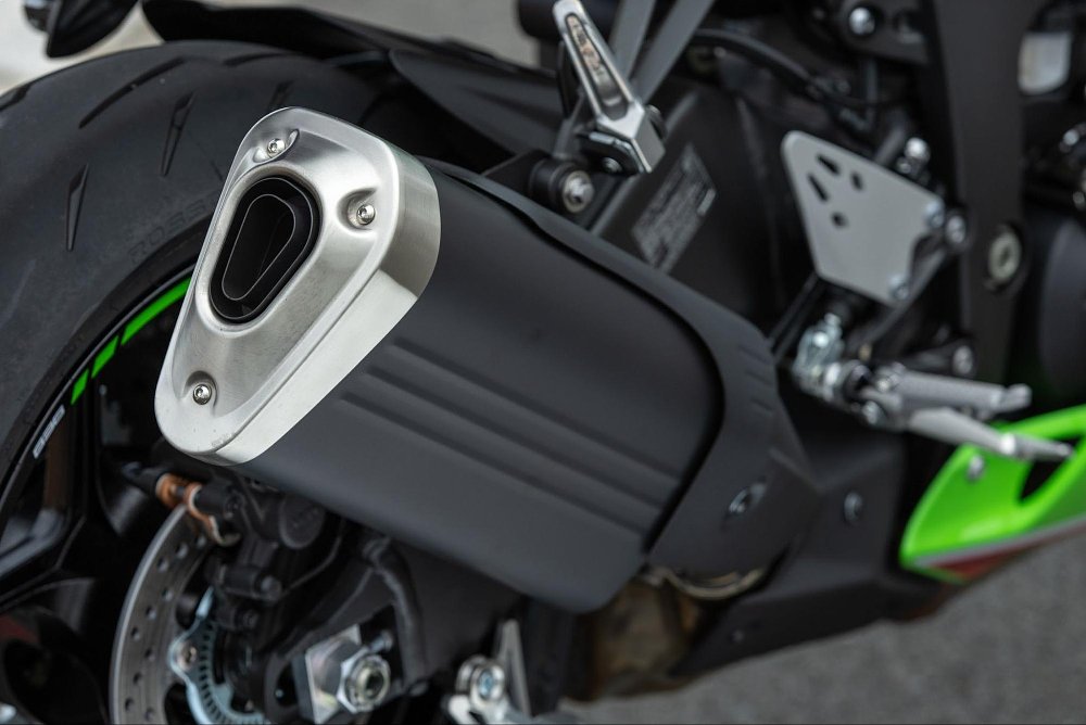 a close up view of the exhaust pipe on the 2024 kawasaki ninja zx-6r