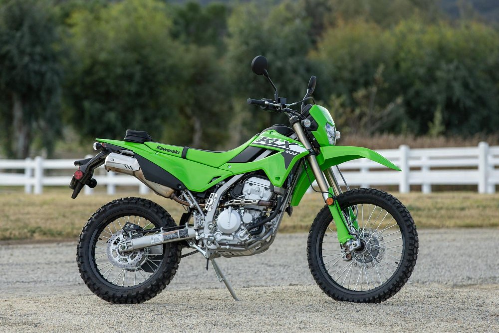 A front side view of the 2024 KLX300 dual sport motorcycle