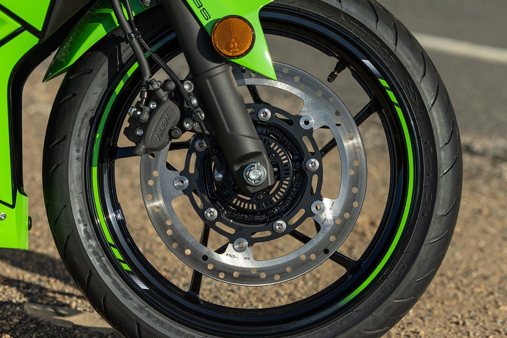 close view of front wheel and brakes