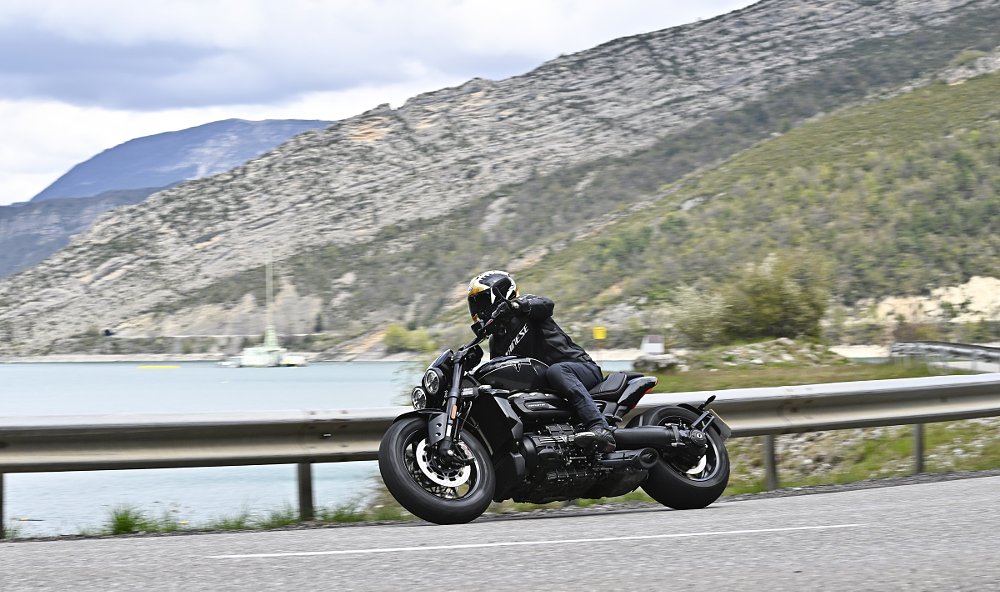 Rocket 3 Storm rider in a curve by the lake