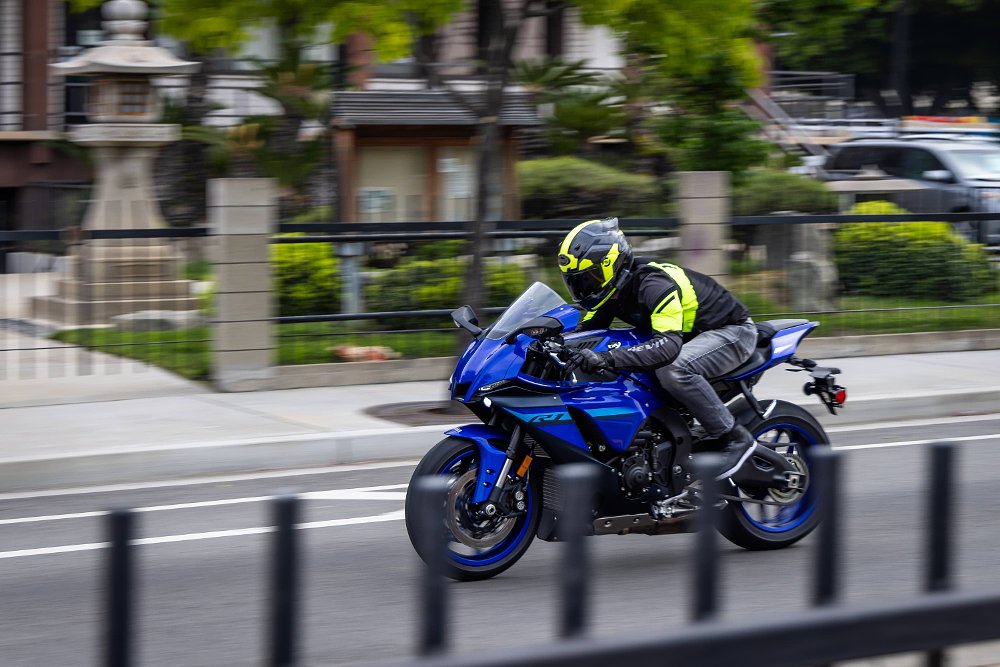 A 2024 Yamaha R1 speeds through Japantown in Los Angeles.