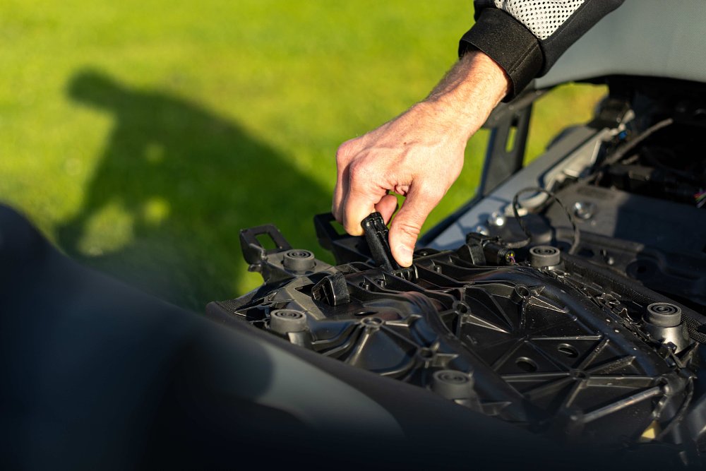 2024 BMW R 1300 GS seat foam density adjustment lever detail.