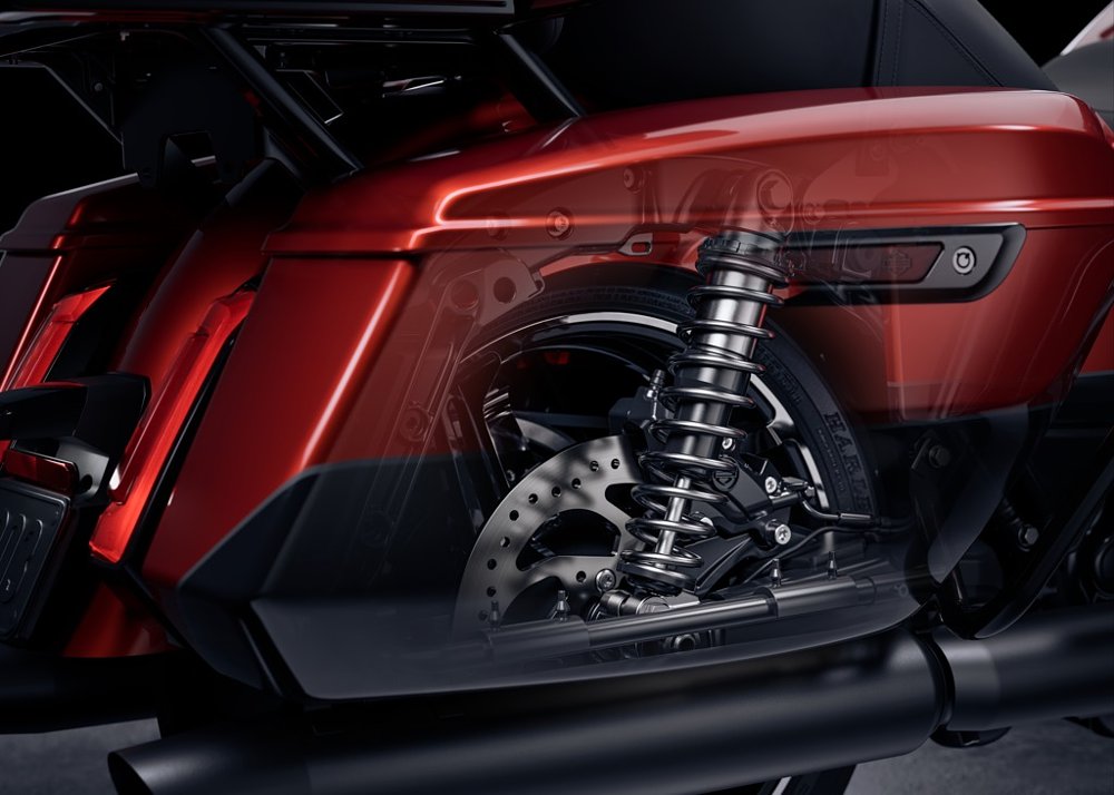 studio photo showing access to rear shock absorber behind the saddlebag