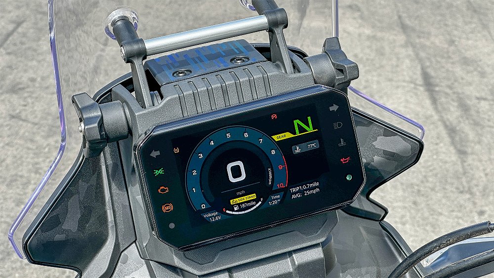 A close-up of the CFMOTO Ibex 450's five-inch TFT dash.