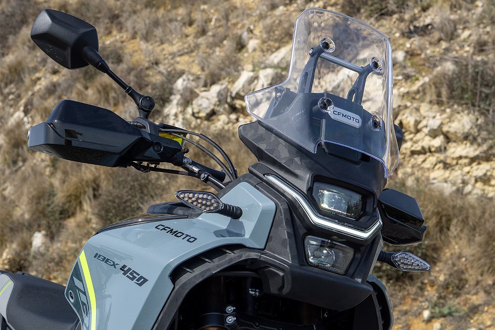 A shot of the CFMOTO Ibex 450's front headlight array.